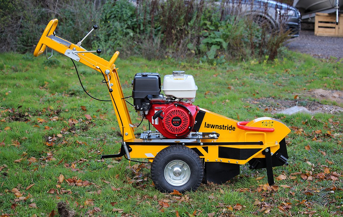 360 SW stump grinder, side profile with the engine and handlebar