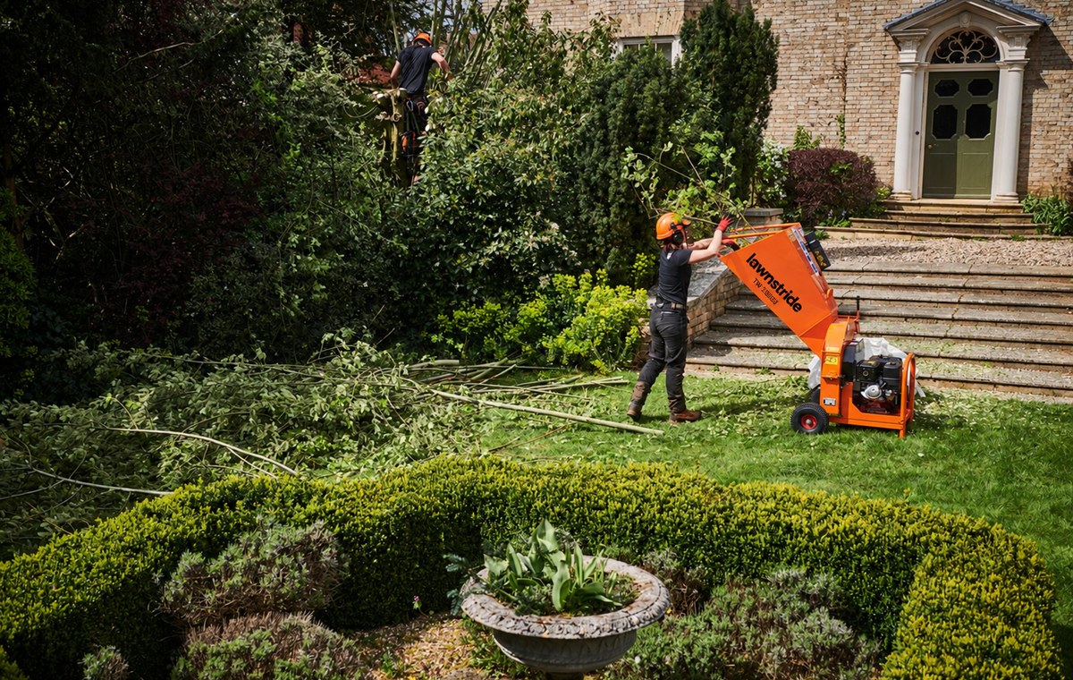 TW 13/75G petrol wood chipper, working on an estate driveway